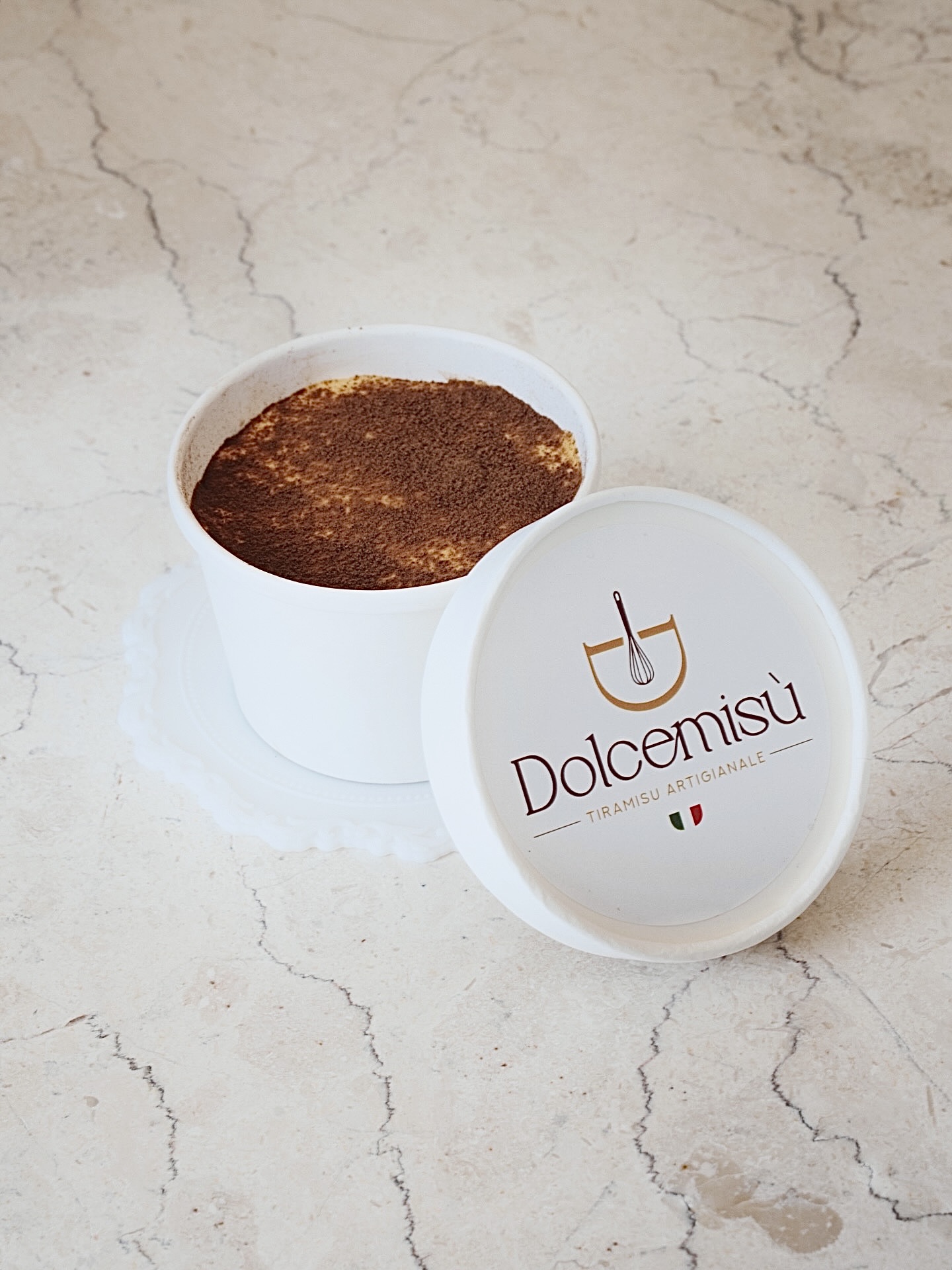 Classic tiramisù dusted with cocoa